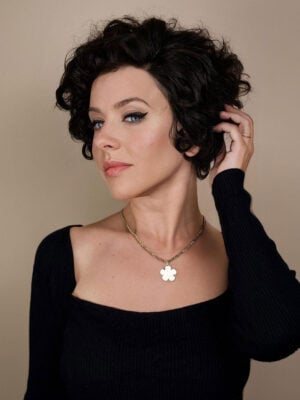 IMG_1715-a t-part curly human wig - 6" natural black.