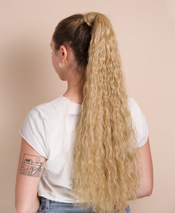 wavy-pony-back-a vegan fiber long wavy ponytail - honey blonde 26".