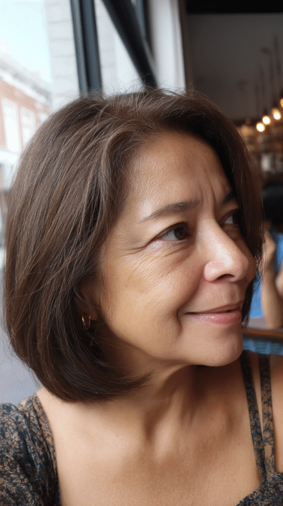 Asymmetrical bob haircut with one side longer than the other for a chic, edgy appearance.