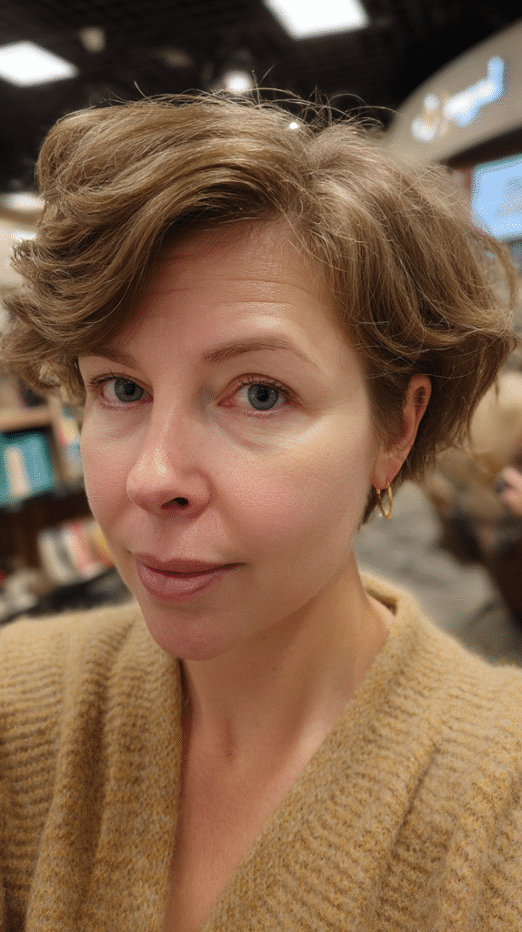 Chic shaggy bob with soft face-framing layers, ideal for highlighting cheekbones and adding modern flair.